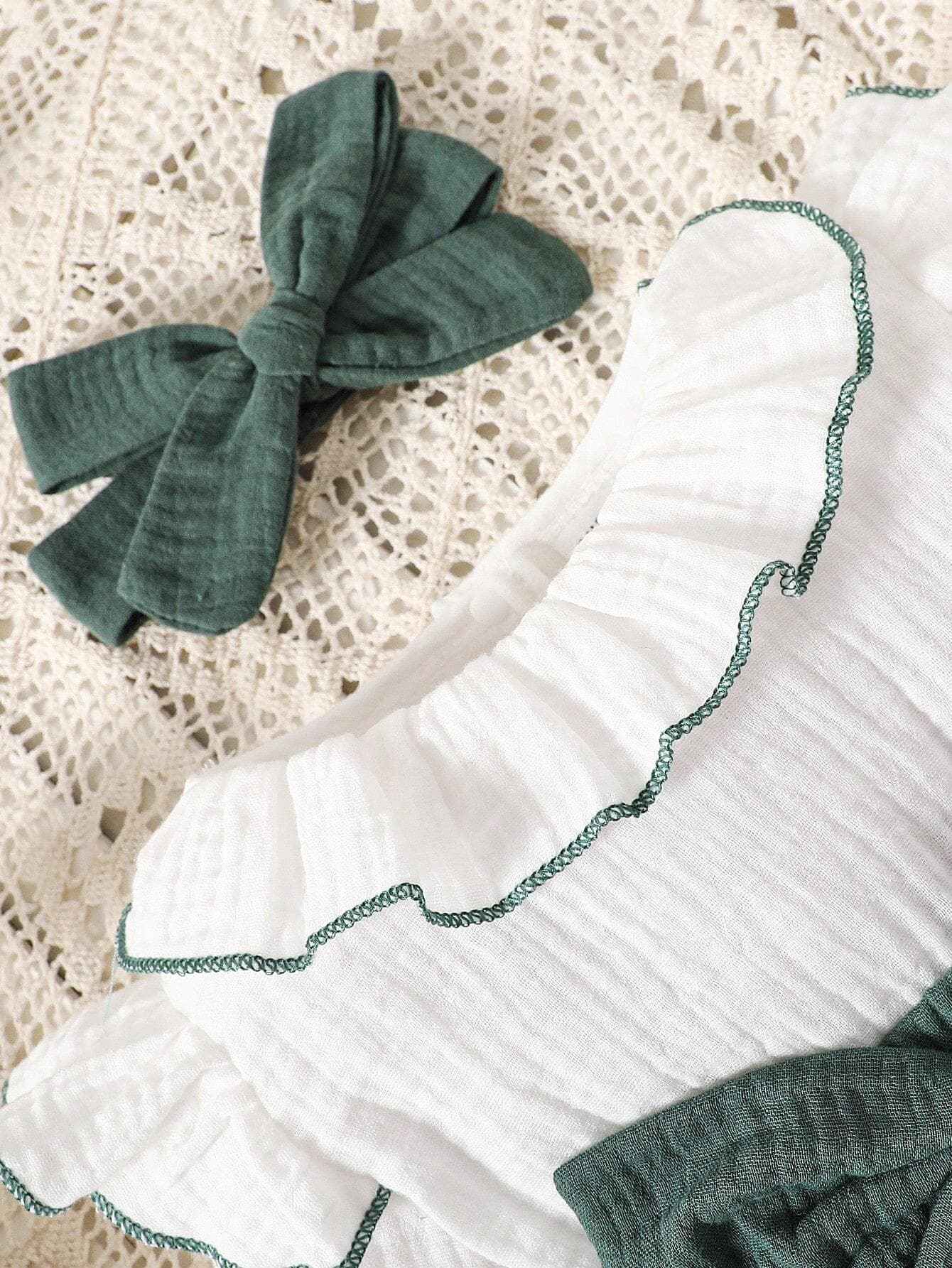 رومبير بناتي باللون الأخضر والأبيض مع إكسسوار للشعر