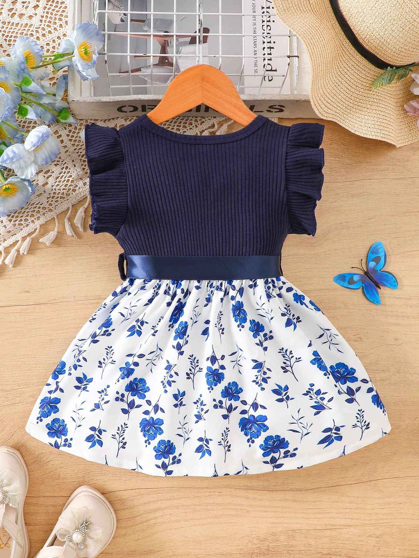 رومبير بناتي باللون الكحلي وبتصميم الورود