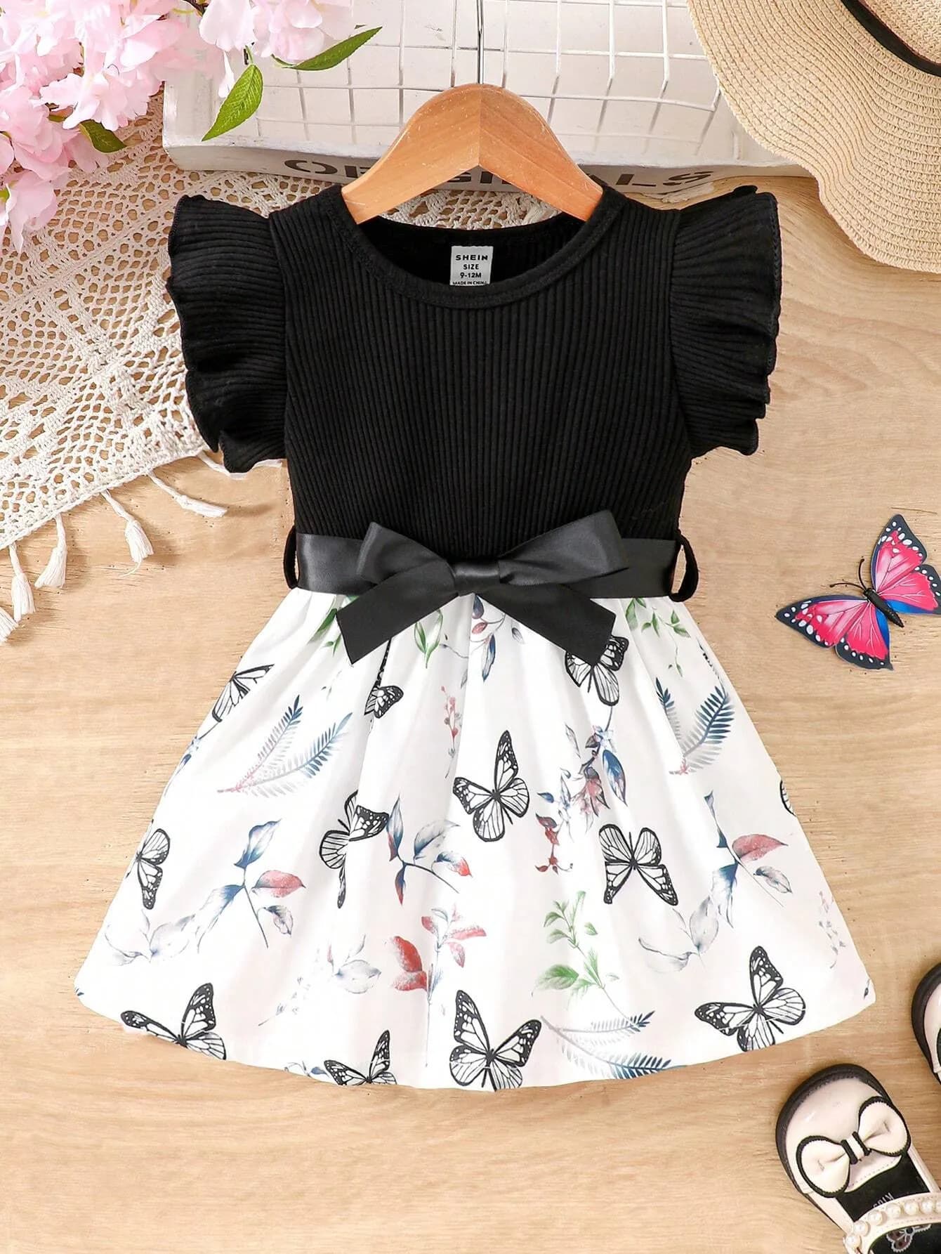 رومبير بناتي باللون الأسود وبتصميم الفراشات