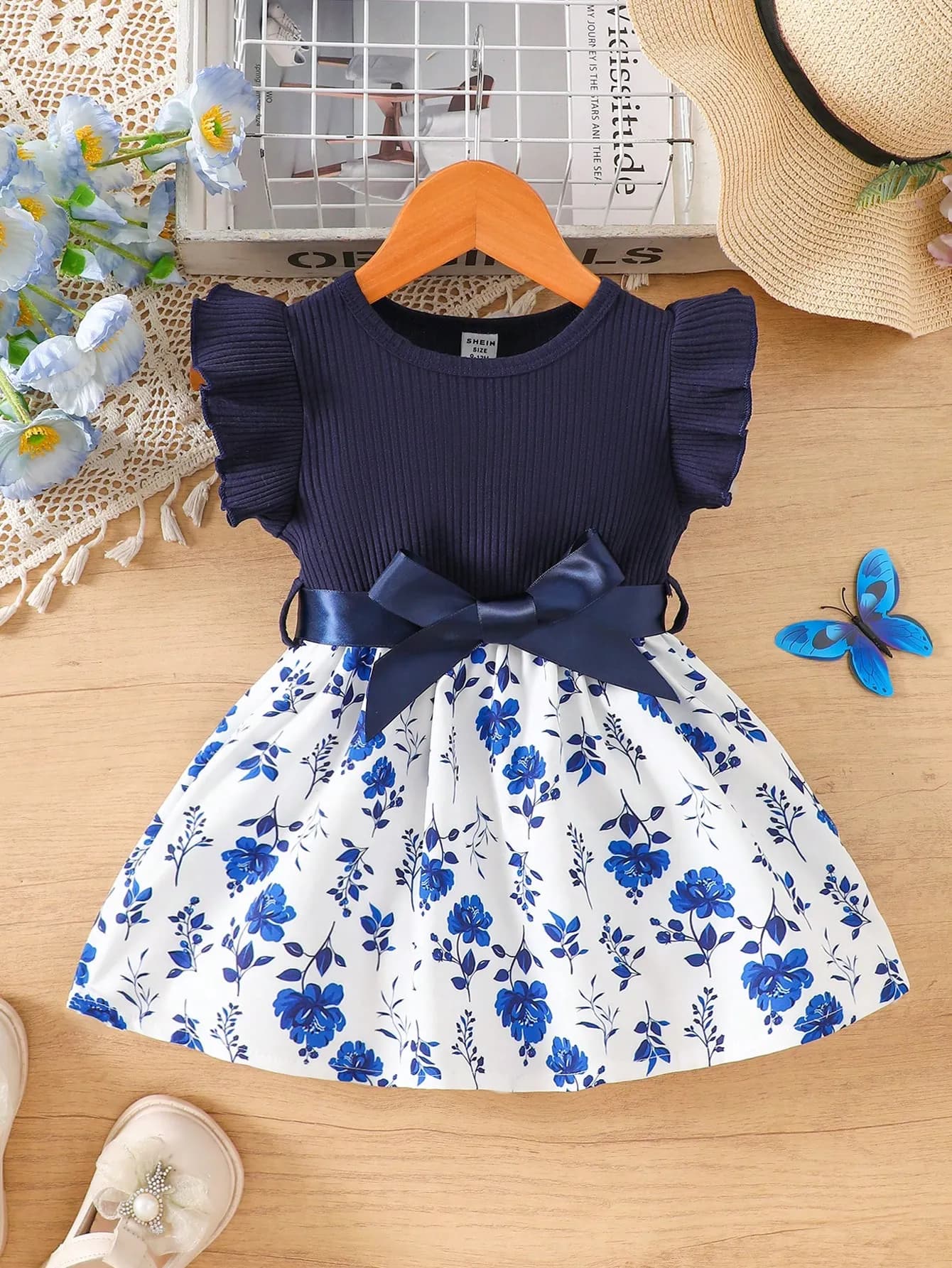 رومبير بناتي باللون الكحلي وبتصميم الورود