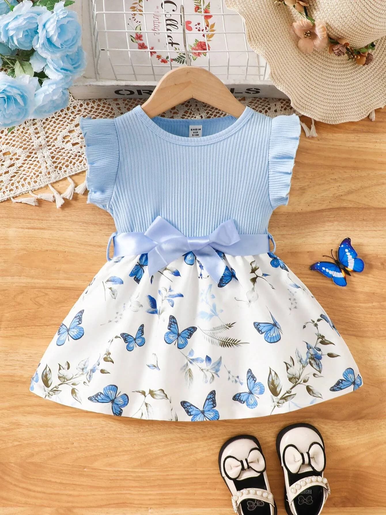 رومبير بناتي باللون الكحلي وبتصميم الورود